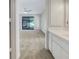Bright bedroom with sliding glass doors to backyard at 18978 Mcgrath Cir, Port Charlotte, FL 33948