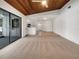 Spacious living room with access to the kitchen and patio at 18978 Mcgrath Cir, Port Charlotte, FL 33948
