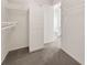 Spacious walk-in closet with built-in shelving at 18978 Mcgrath Cir, Port Charlotte, FL 33948