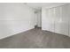 Spacious bedroom featuring carpet and built-in closet at 18978 Mcgrath Cir, Port Charlotte, FL 33948