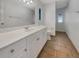 Clean bathroom with updated vanity and flooring at 18978 Mcgrath Cir, Port Charlotte, FL 33948