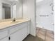 Updated bathroom with walk-in shower and grab bars at 18978 Mcgrath Cir, Port Charlotte, FL 33948