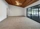 Large bedroom with wood ceiling and patio access at 18978 Mcgrath Cir, Port Charlotte, FL 33948