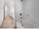 Bathroom with bathtub and view of vanity area at 18978 Mcgrath Cir, Port Charlotte, FL 33948