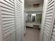 Clean bathroom with double vanity and linen closets at 20102 Lorenzo Ave, Port Charlotte, FL 33952
