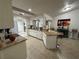 Kitchen boasts granite countertops and ample cabinet space at 20102 Lorenzo Ave, Port Charlotte, FL 33952