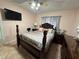 Bedroom with a queen-size bed and ceiling fan at 20102 Lorenzo Ave, Port Charlotte, FL 33952