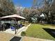 Spacious backyard with a gazebo, patio, and lush lawn at 20102 Lorenzo Ave, Port Charlotte, FL 33952