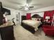 Bright bedroom with king-size bed and access to bathroom at 20102 Lorenzo Ave, Port Charlotte, FL 33952