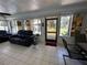 Spacious screened porch with backyard access and seating at 20102 Lorenzo Ave, Port Charlotte, FL 33952