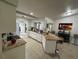 Kitchen with granite countertops and an island with seating at 20102 Lorenzo Ave, Port Charlotte, FL 33952