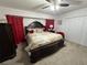 Spacious Primary bedroom with king-size bed and ensuite bathroom at 20102 Lorenzo Ave, Port Charlotte, FL 33952