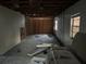 Unfinished interior room, showing exposed studs and wires at 6114 S 3Rd St, Tampa, FL 33611