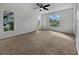 Spacious bedroom with neutral walls and carpeting at 7526 Fairlinks Ct, Sarasota, FL 34243