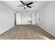 Spacious bedroom with neutral carpeting and ceiling fan at 7526 Fairlinks Ct, Sarasota, FL 34243