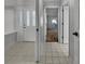 Inviting entryway with tile floors and views to living areas at 7526 Fairlinks Ct, Sarasota, FL 34243