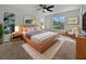 Main bedroom with large windows and modern furniture at 7526 Fairlinks Ct, Sarasota, FL 34243
