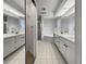 Large bathroom with double vanity and soaking tub at 7526 Fairlinks Ct, Sarasota, FL 34243
