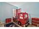 Fun room featuring a custom fire truck bed and playful decor at 11909 Mandevilla Ct, Tampa, FL 33626