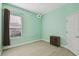 Bright bedroom with a soccer ball ceiling fixture at 11909 Mandevilla Ct, Tampa, FL 33626
