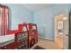 Fun room featuring a custom fire truck bed and playful decor at 11909 Mandevilla Ct, Tampa, FL 33626