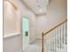 Bright hallway with staircase leading to the upper level, offering an airy and inviting atmosphere at 11909 Mandevilla Ct, Tampa, FL 33626