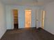 Bedroom with neutral carpet, closet, and ensuite bathroom at 642 Bird Bay E Dr # 205, Venice, FL 34285