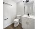 Clean bathroom with white vanity, toilet and tile flooring at 290 Dragon Rd, Venice, FL 34293