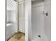 Simple bathroom with shower and linen closet at 290 Dragon Rd, Venice, FL 34293