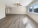 Spacious living room with neutral walls and hardwood flooring at 4143 Waikiki Dr, Sarasota, FL 34241