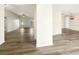 Bright living room with wood-look floors and ceiling fan at 4143 Waikiki Dr, Sarasota, FL 34241