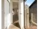Clean hallway with wood-look floors and access to backyard at 4143 Waikiki Dr, Sarasota, FL 34241
