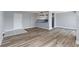 Open concept living space with kitchen and wood-look floors at 3315 58Th S Ave # 508, St Petersburg, FL 33712