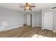Spacious bedroom featuring wood-look floors and ample closet space at 3315 58Th S Ave # 508, St Petersburg, FL 33712