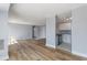 Open living room with kitchen and wood-look floors at 3315 58Th S Ave # 508, St Petersburg, FL 33712