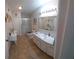 Large bathroom with vanity, shower and toilet at 906 Bluewater Dr, Sun City Center, FL 33573