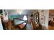 Bedroom with a bed, dresser, window with curtains, and decorations on the wall at 906 Bluewater Dr, Sun City Center, FL 33573