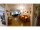 Dining room with wood table and chairs, chandelier, and decorative wall art at 906 Bluewater Dr, Sun City Center, FL 33573