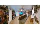 Spacious living room with comfortable seating, and a flat-screen TV at 906 Bluewater Dr, Sun City Center, FL 33573