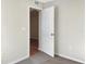 Bedroom with neutral walls, carpeting, and an open door to another room at 922 Wynnmere Walk Ave, Ruskin, FL 33570