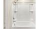 Clean bathroom with a shower/tub combo and neutral colors at 922 Wynnmere Walk Ave, Ruskin, FL 33570