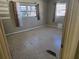 Bedroom with terrazzo floor and window at 11340 5Th E St, Treasure Island, FL 33706