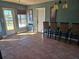 Dining area with bar stools and view of pool at 11340 5Th E St, Treasure Island, FL 33706