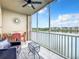 Spacious screened balcony overlooking lake and community at 10530 Boardwalk Loop # 304, Lakewood Ranch, FL 34202
