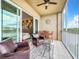 Relaxing balcony with seating and water views at 10530 Boardwalk Loop # 304, Lakewood Ranch, FL 34202