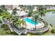 Relaxing pool area with cabana and waterfront views at 10530 Boardwalk Loop # 304, Lakewood Ranch, FL 34202
