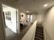 Spacious upstairs hallway leading to an office and additional bedroom spaces at 10922 Brightleaf Ct, Riverview, FL 33569