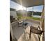 Relaxing screened patio with pond views at 10922 Brightleaf Ct, Riverview, FL 33569