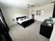 Spacious bedroom with a king-size bed, ceiling fan and ample closet space at 10922 Brightleaf Ct, Riverview, FL 33569