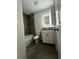 Clean bathroom with a bathtub, toilet, and vanity at 10922 Brightleaf Ct, Riverview, FL 33569